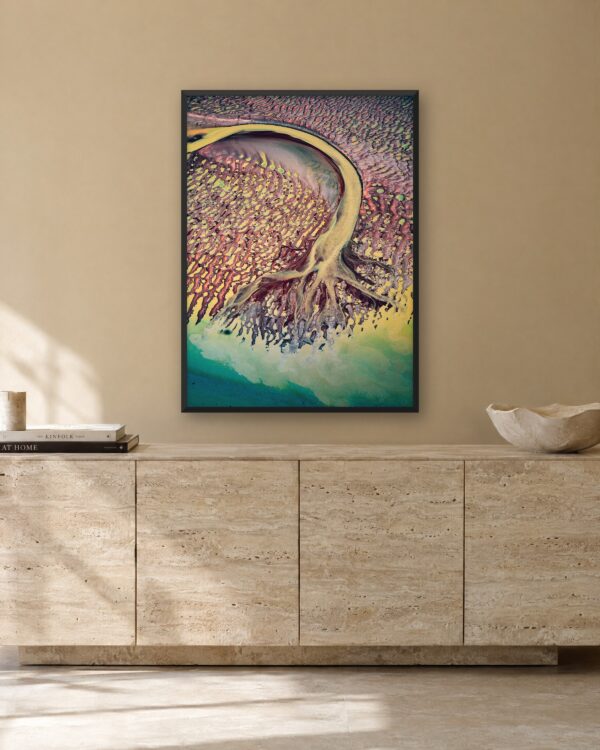 Tidal Tree by Scott Jon, black framed print in a cover, sand wall and travertine sideboard